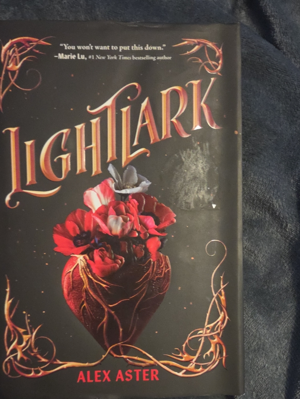 Lightlark by Alex Aster - Hardcover with Red Floral Heart Cover